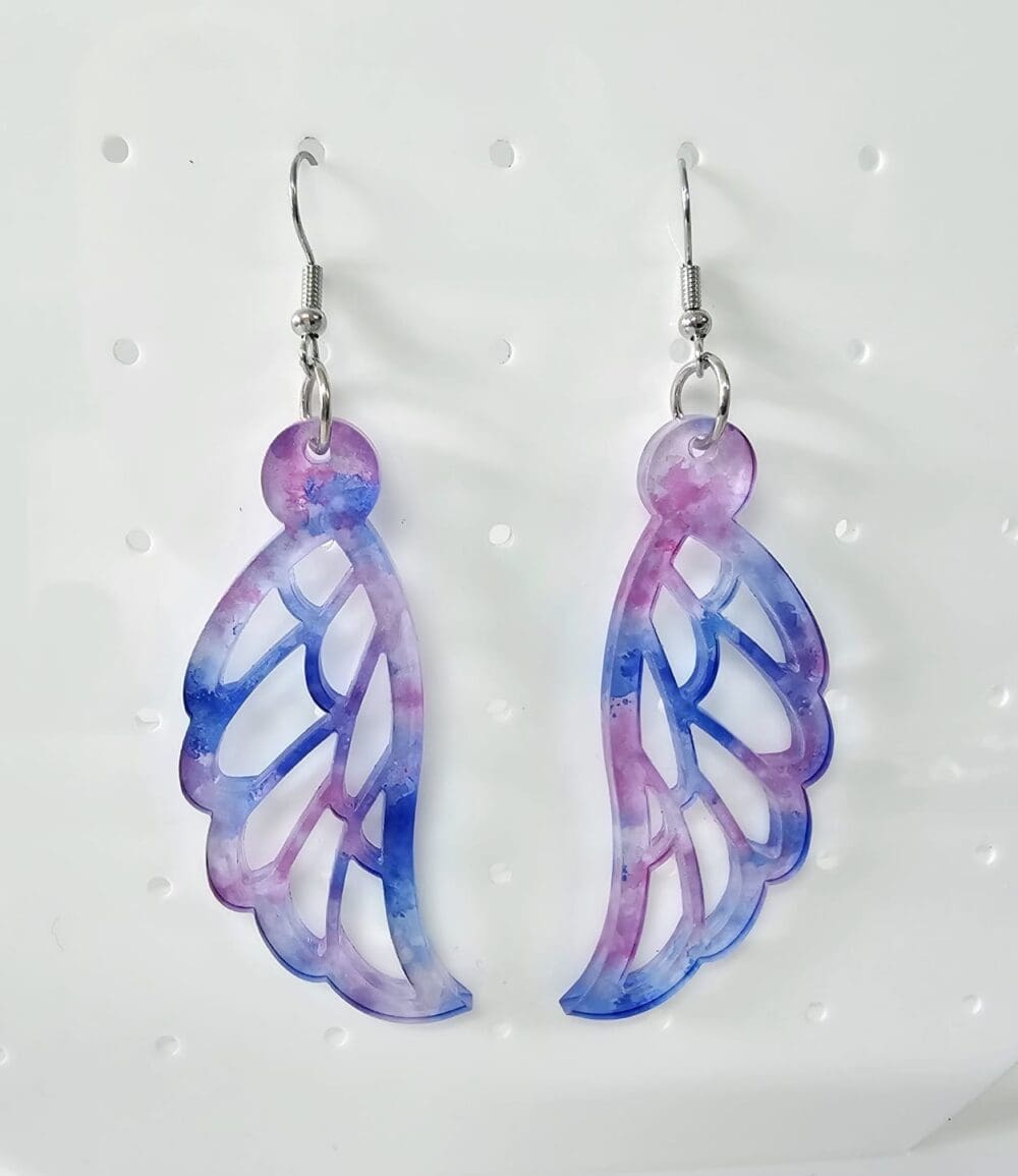 IMG-20241121-WA0059 Laser Sublimation Blanks : (EARR4) 3mm Blank Subli Acrylic Angel Winged Earrings + attachments